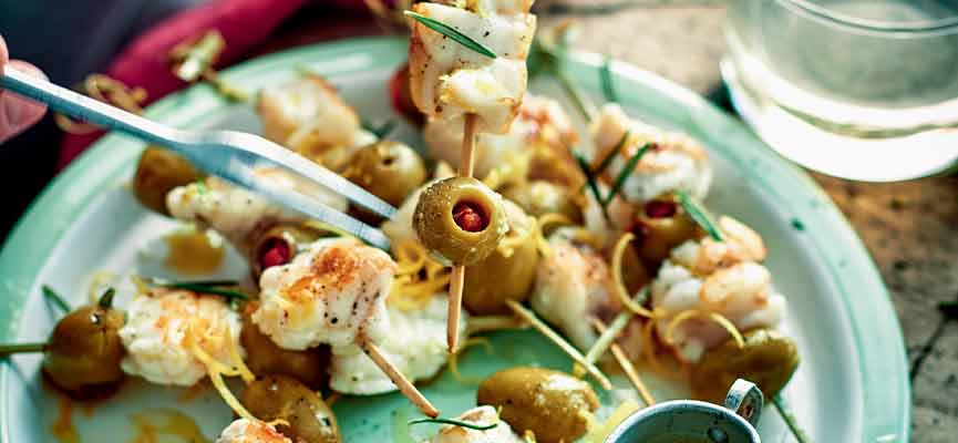 Monkfish skewers with olives