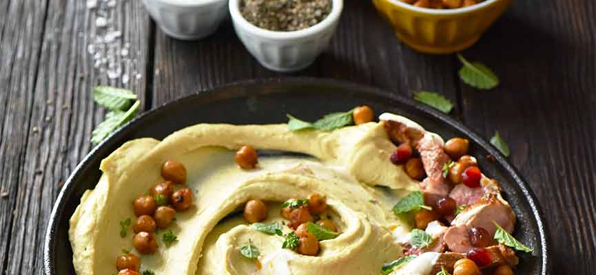 Gigot d'agneau à la harissa et au houmous Gigot d'agneau à la harissa et au houmous